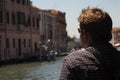 Tourist on Venice canal