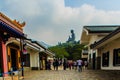 The tourist visited Giant Tian Tan Buddha statue on the peak of the mountain at Po Lin Monastery in Lantau Island, Hong Kong.