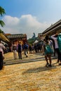 The tourist visited Giant Tian Tan Buddha statue on the peak of the mountain at Po Lin Monastery in Lantau Island, Hong Kong.