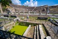 Tourist visiting the ancient bathing pool in Bergama Asklepion Archaeological Site.