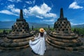 Tourist visiting in ancient largest Buddhist Borobudur Temple in Java Indonesia