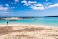 Tourist visiting Els Pujols beach in Formentera island Royalty Free Stock Photo