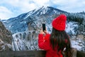 Tourist visiting Landwasser Viaduct world heritage in Swiss Alps snow winter scenery, Switzerland