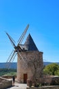 Tourist visiting old windmill in goult village, high provence Royalty Free Stock Photo