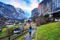 Tourist visiting village of Lauterbrunnen in the Bernese Oberland, Switzerland