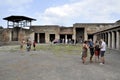 Tourist visits the excavations of Pompeii, during the reopening after the maintenance interventions of the Villa of the Mysteries Royalty Free Stock Photo