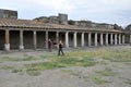 Tourist visits the excavations of Pompeii, during the reopening after the maintenance interventions of the Villa of the Mysteries Royalty Free Stock Photo