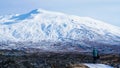 Tourist walk in Iceland volcanic landscape moutnian background