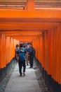 Tourist walk and see Red torii at Fushimi Inari-taisha shrine