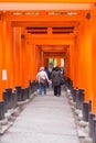 Tourist walk and see Red torii at Fushimi Inari-taisha shrine