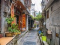 Tourist walking in alley building district of Fenghuang ancient town.