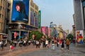 Tourist walking along famous Nanjing Lu, Shanghai China