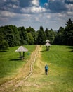 A tourist walking down a path from Swiety Krzyz mountain, Poland. Royalty Free Stock Photo