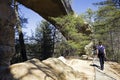 Tourist walking by the natural bridge