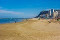 Tourist walking on Pesaro beach in the summer season