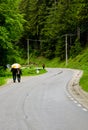 Tourist walking in the road