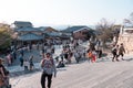 Tourist walking on stairs at Kiyomizu-dera temple