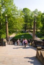 Tourist walking on the Strelecky Island with weir on Vltava river Royalty Free Stock Photo