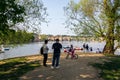 Tourist walking on the Strelecky Island with weir on Vltava river Royalty Free Stock Photo