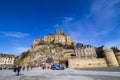 Tourist walking to Mont Saint Michel Normandy France.