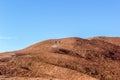 tourist walking up the Uluru, ayers Rock, the Red Center of Australia, Australia Royalty Free Stock Photo