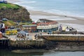 Tourists on Whitby pier at the beach Royalty Free Stock Photo