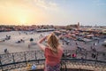 Tourist watching over Jamaa el-Fna Market Marrakesh - Morocco. S