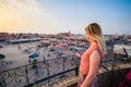 Tourist watching over Jamaa el-Fna Market Marrakesh - Morocco. S