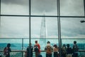 Tourist watching the Shard Tower. View from Sky Garden in London