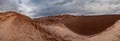 Tourist watching the sunset at the Valle de la Luna, Atacama desert, Chile Royalty Free Stock Photo