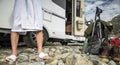 Tourist Wearing Hotel Slippers and Bathrobe in Front of His RV Camper Van Enjoying the Place Royalty Free Stock Photo