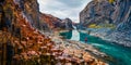 Tourist went to the bottom of canyon and admired the beauty of basalt columns. View from flying drone of Studlagil Canyon. Picture