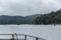 Tourist wildlife watching boats on a river in the Periyar National Park in Thekkady, Kerala, South India