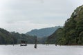 Tourist wildlife watching boats on a river in the Periyar National Park in Thekkady, Kerala, South India