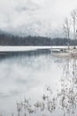 Tourist at winter mountain lake Royalty Free Stock Photo