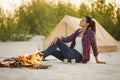 Tourist Woman in the Camp Near Campfire Royalty Free Stock Photo