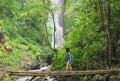 Tourist woman trekking in Bali jungle