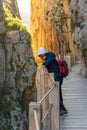 Tourist woman in El Caminito del Rey tourist attraction Malaga, Spain