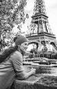 Tourist woman on embankment in Paris, France having excursion Royalty Free Stock Photo