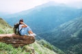 Tourist woman enjoy with beautiful view on mountains and valley Royalty Free Stock Photo