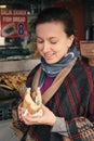 Tourist woman enjoy traditional turkish street food in Istanbul