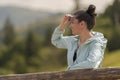 Tourist Woman Enjoying View of Mountain Valley Royalty Free Stock Photo