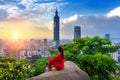 Tourist woman enjoying view on mountains in Taipei, Taiwan. Royalty Free Stock Photo