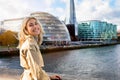 Tourist woman enjoys the view to the skyline of London, United Kingdom Royalty Free Stock Photo