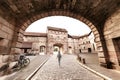 Woman at the entrance gate to old town of Nuremberg, tourist and travel destination
