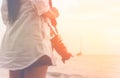 Tourist woman holding camera stand