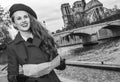 Tourist woman with map in Paris looking into the distance Royalty Free Stock Photo