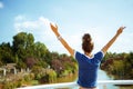 Tourist woman on river boat rejoicing while having river voyage