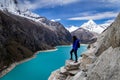 Tourist woman staring at the amazing Lake Paron in Cordillera Blanca of Peru Royalty Free Stock Photo