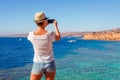 Tourist woman on sunny resort beach at the coast of Red Sea in Sharm el Sheikh, Sinai, Egypt, Asia in summer hot. ÃÂ¡oral reef and